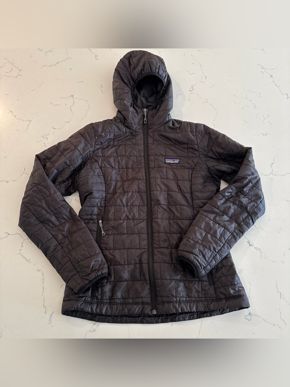 Patagonia’s Women's Nano Puff Hooded Jacket Quilted Puffer Black